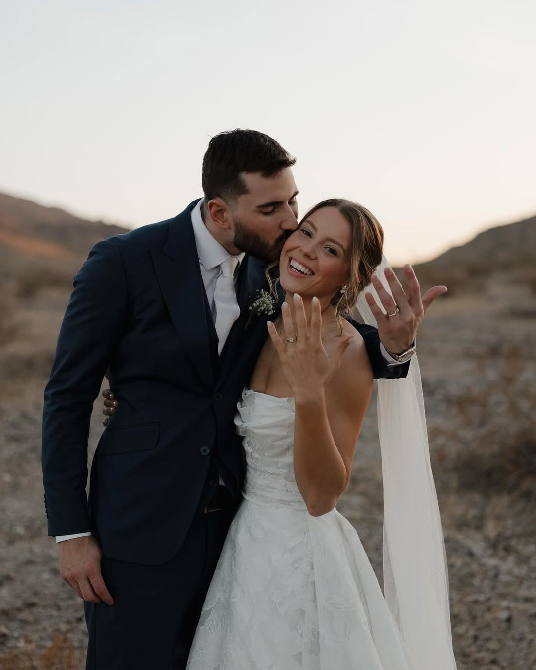 Arizona bride and groom with custom wedding suit details