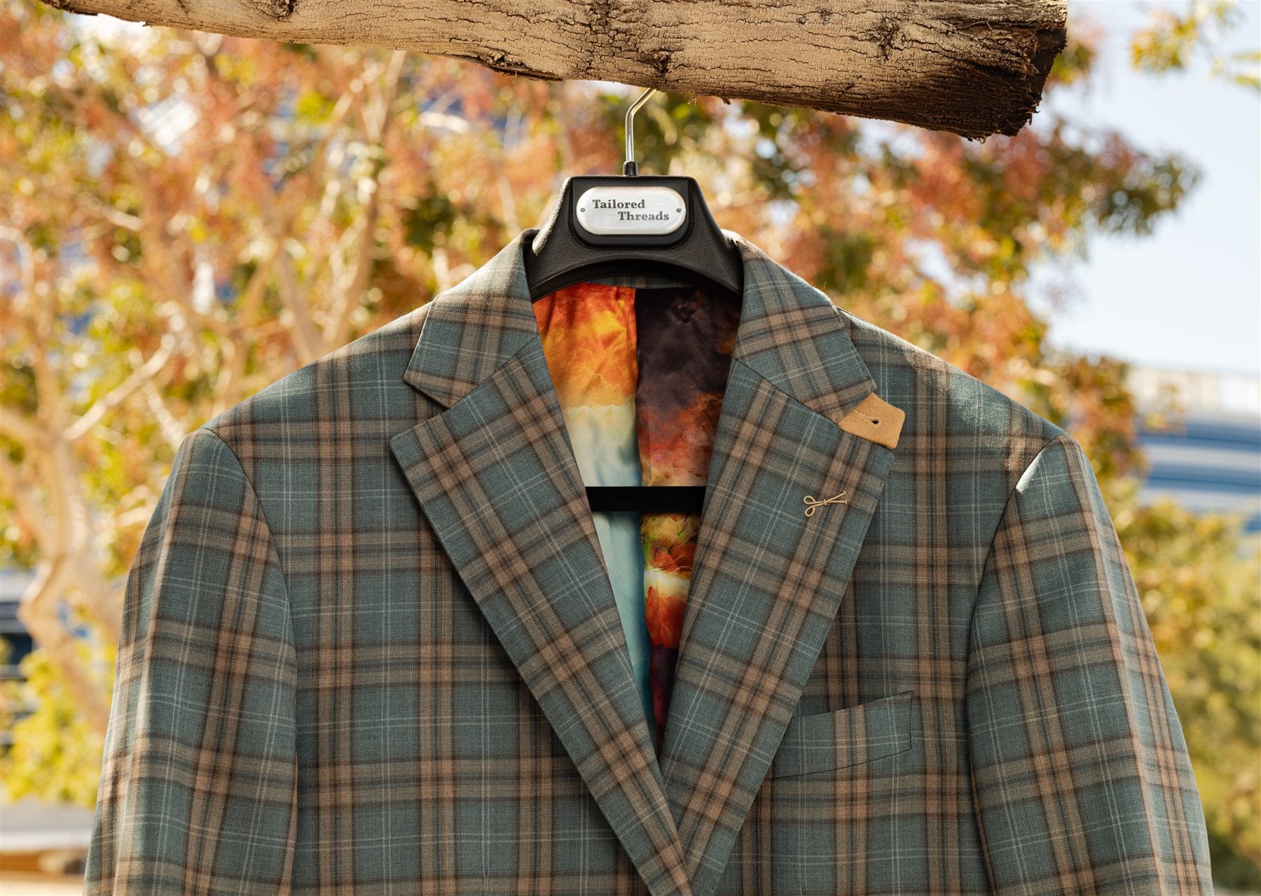 Custom sport coat on a shaped hanger for proper garment care